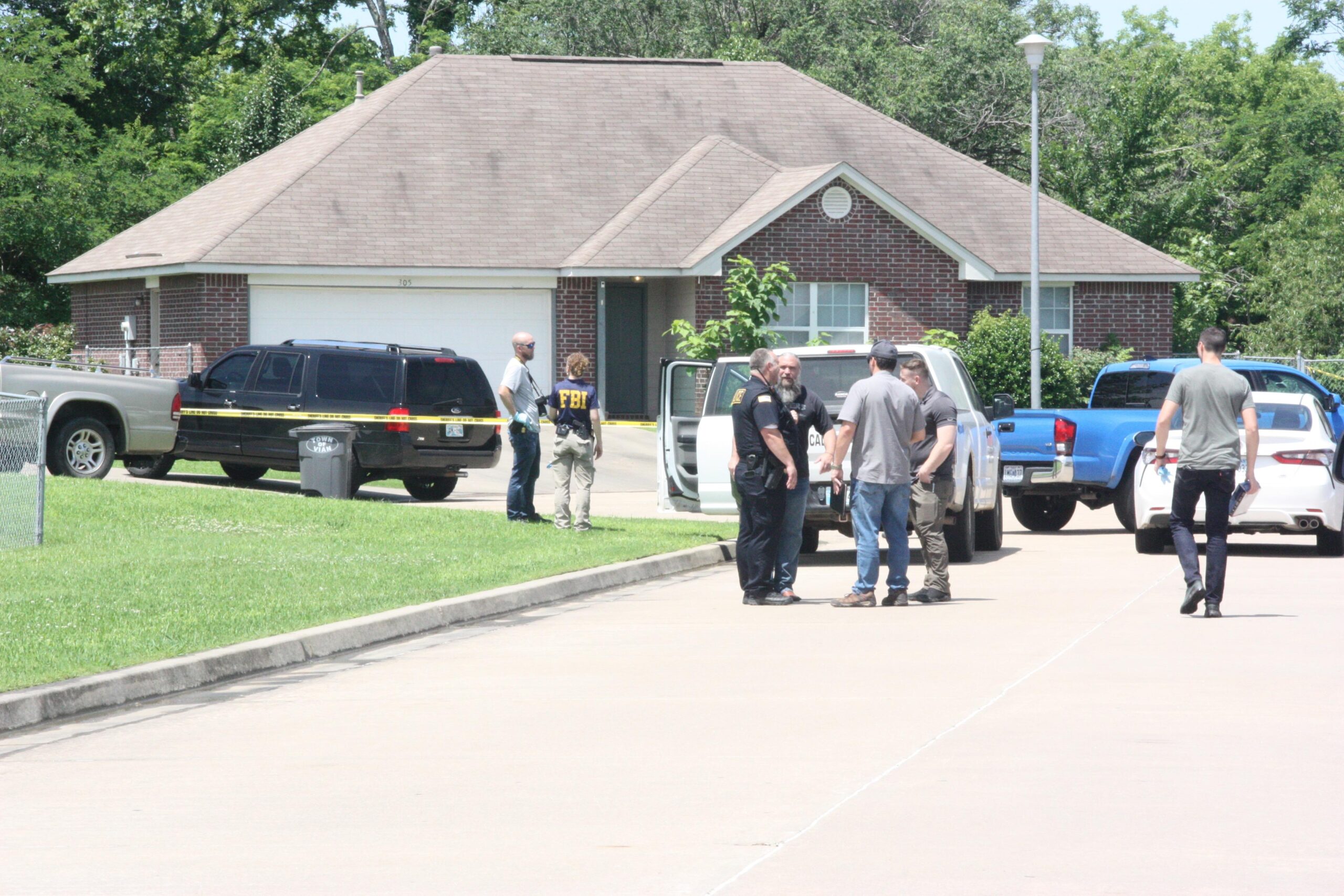 Two Vian residents dead, another shot in face